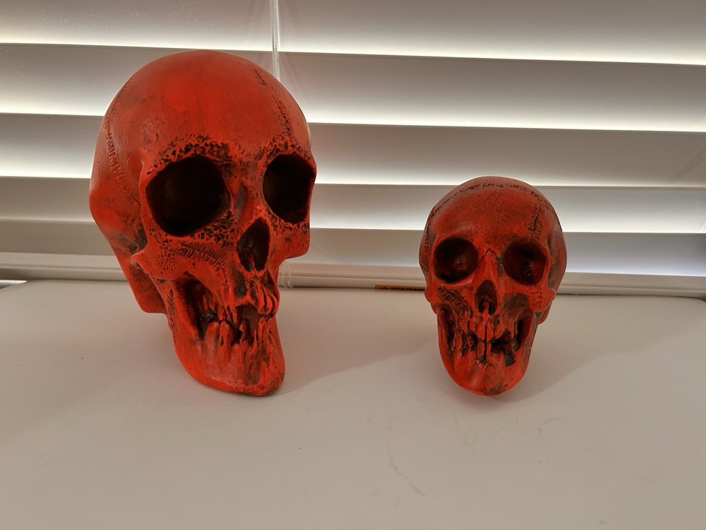 2 EA. RANDOTTI ORIGINAL LARGE & MEDIUM FLUORESCENT RED SKULLS STILL GLOW