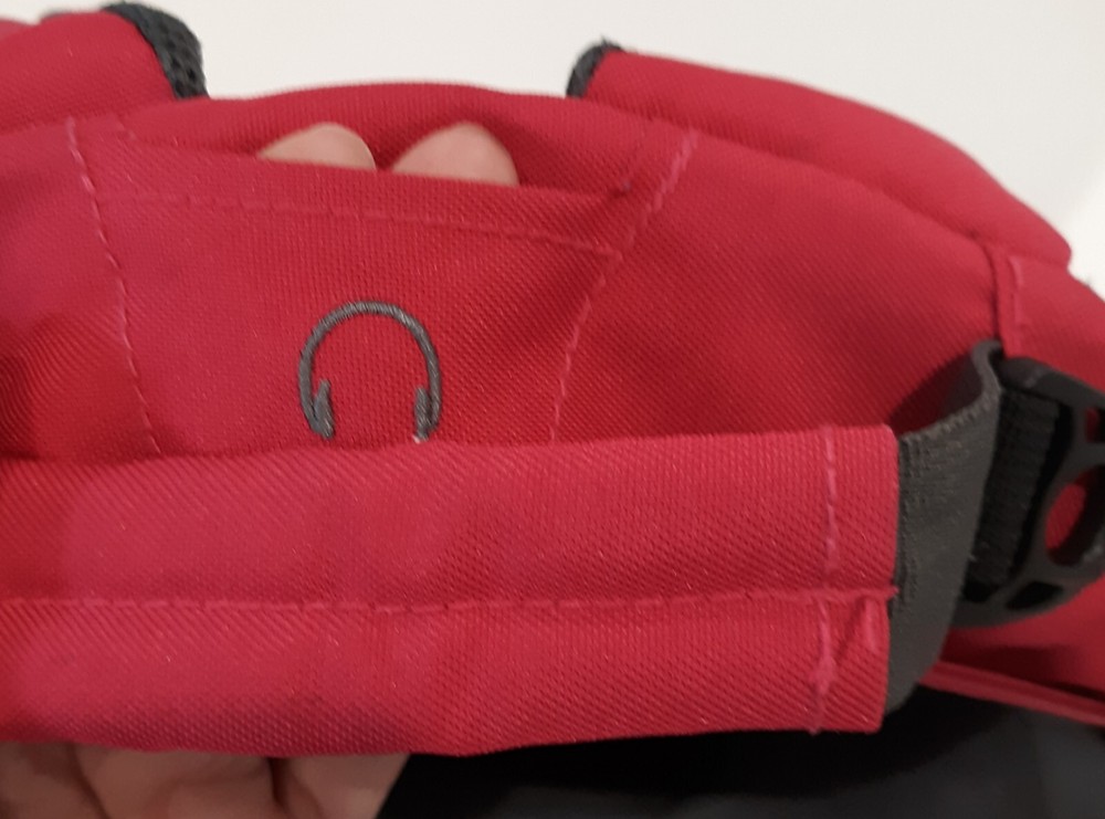 Red backpack made in Switzerland