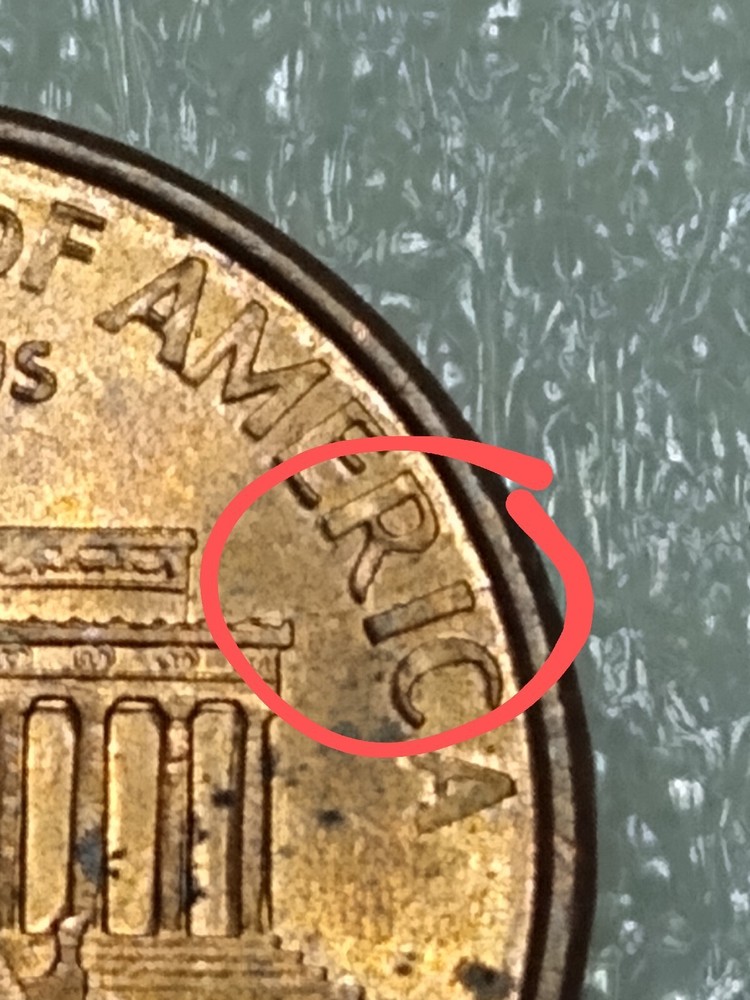 2000 Penny struck through massive grease, date, Cracked Die Error etc.