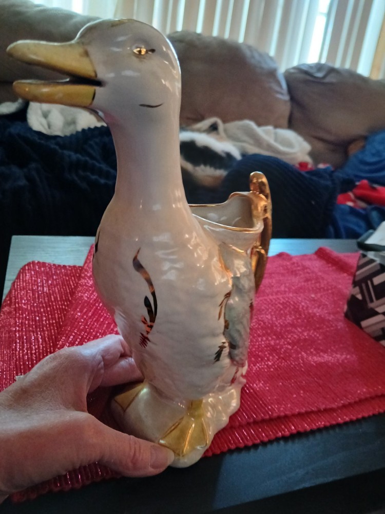 vintage ceramic or porcelain duck-shaped pitcher.