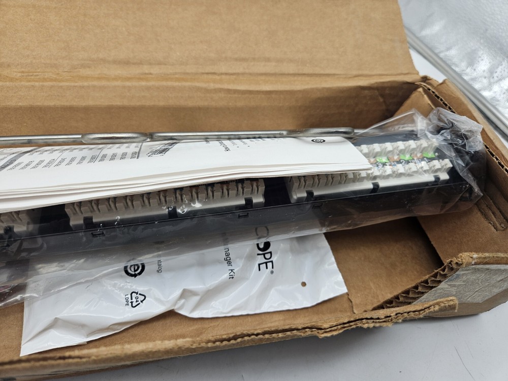 COMMSCOPE CPP-5E-DM-1U-24 CAT 5E 24-PORT PATCH PANEL NEW OPEN