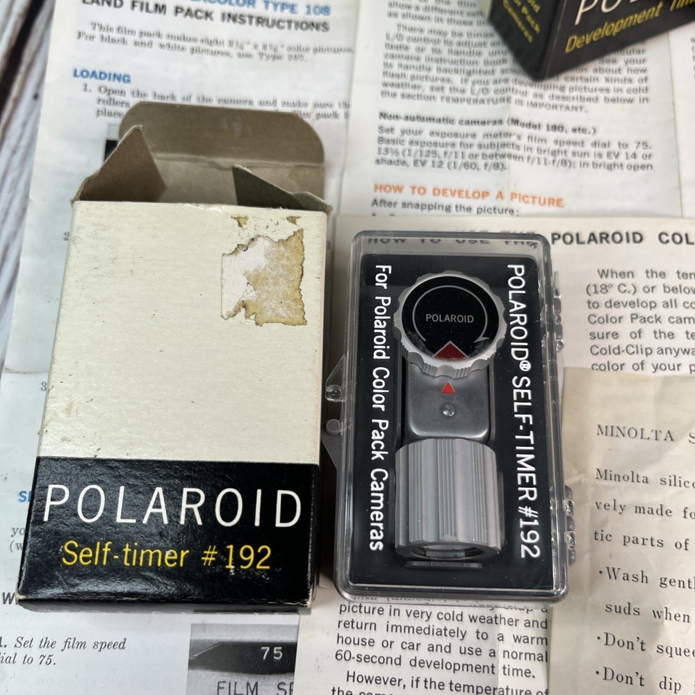 Vintage Polaroid Automatic 100 Land Camera with Case, Timer, Flash, Bulbs, More