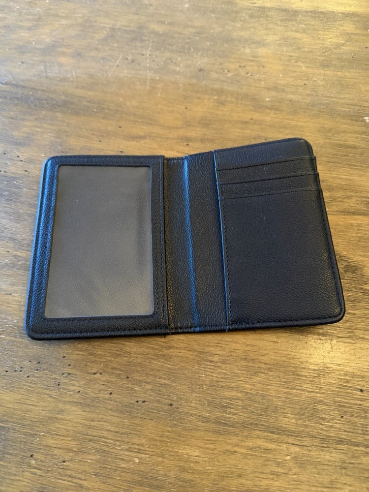 SOLD OUT embossed black Passport Holder Hello Kitty