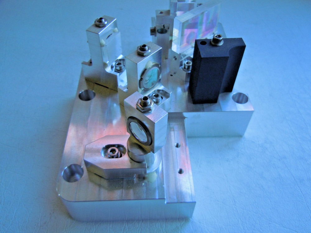 LASER MIRRORS REM0VED FROM BROKIN LASER.