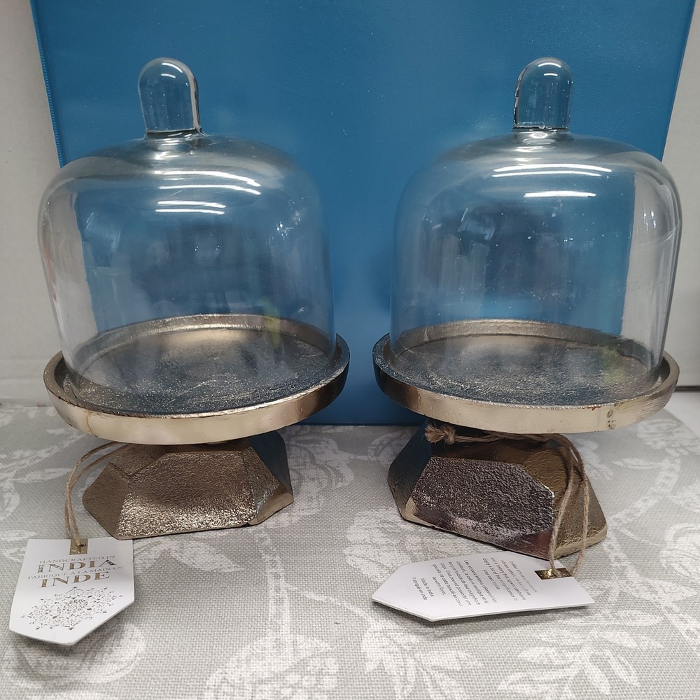 Glass covered cake stand with gold stands