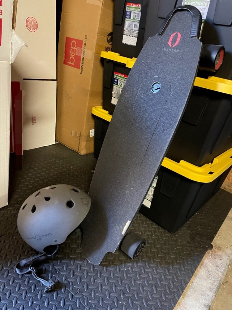 inboard m1 electric skateboard and pro tec helmet