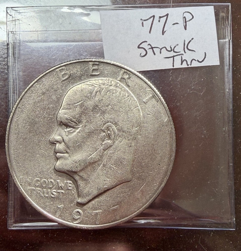 1977-P Eisenhower Ike Dollar - Struck Thru Grease Error
