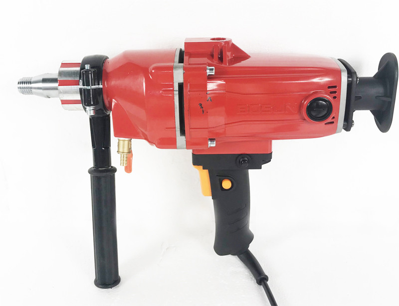 220V Diamond Core Drill Concrete Machine, five drill bits included.