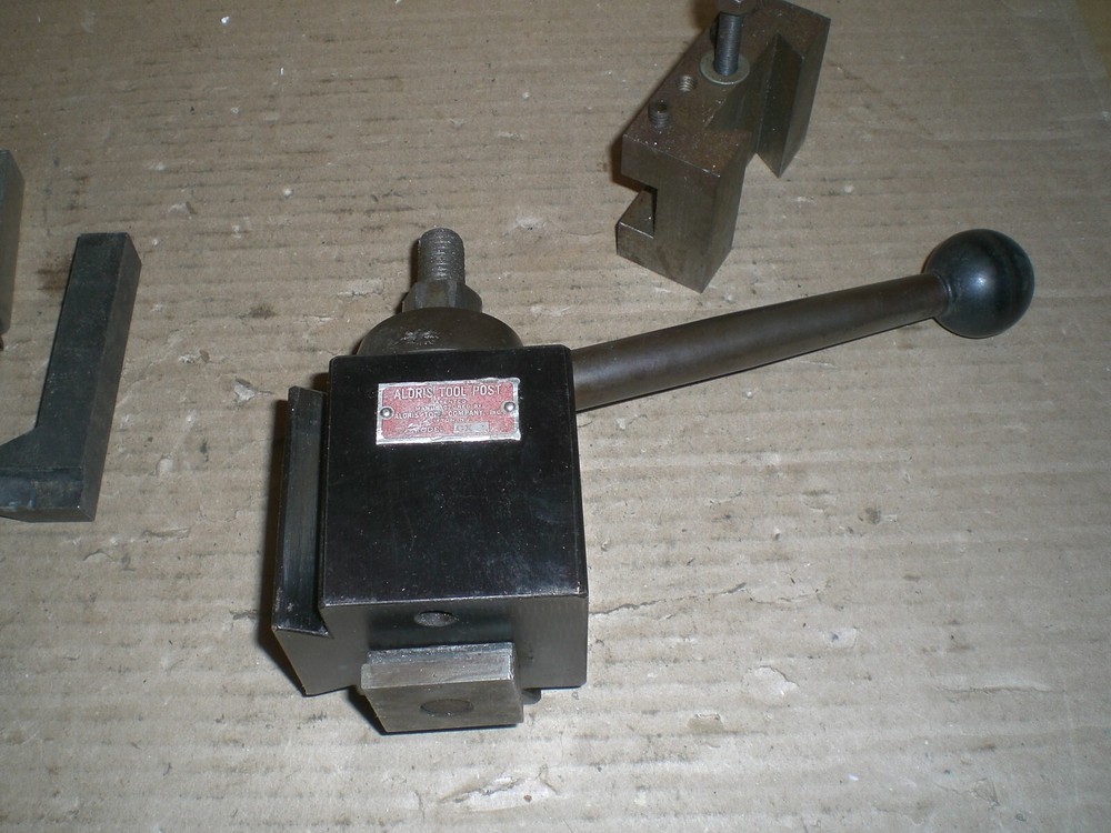 Genuine Aloris CX tool post with 1 tool holder 7 cutting bits