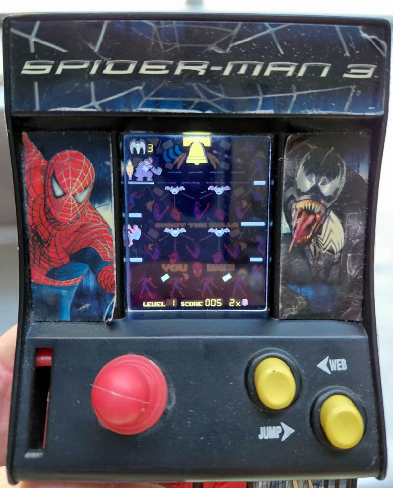 Techno Source 2007 LCD Penny Arcade: Spider-Man 3 Bell Tower Brawl Used (A)