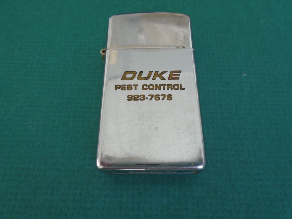 Zippo slim chrome Duke Pest Control lighter