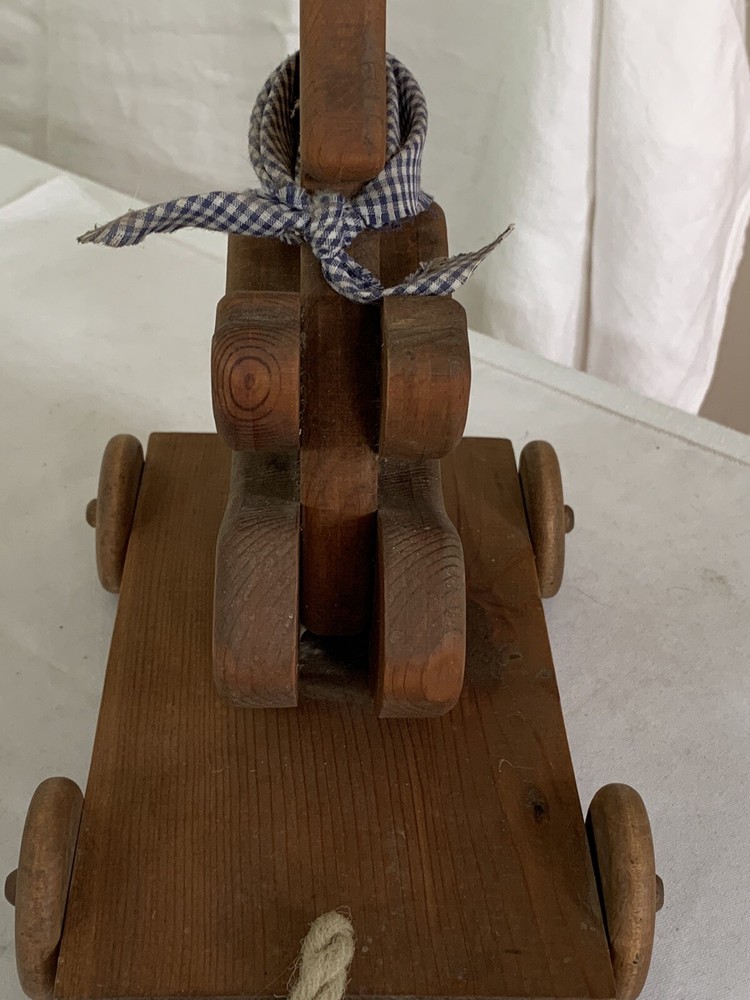 Vintage Wooden Bear Pull Toy On Wheels.