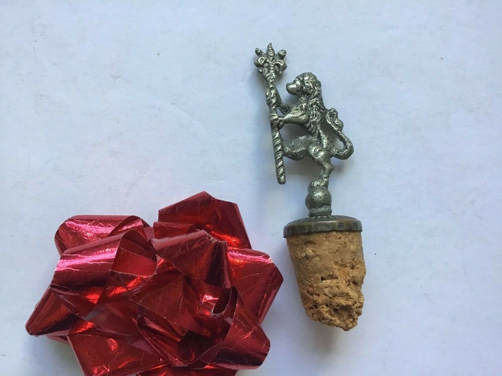 KING LION CORKTOP STOPPER   HELP......what is it ???  pewter ??