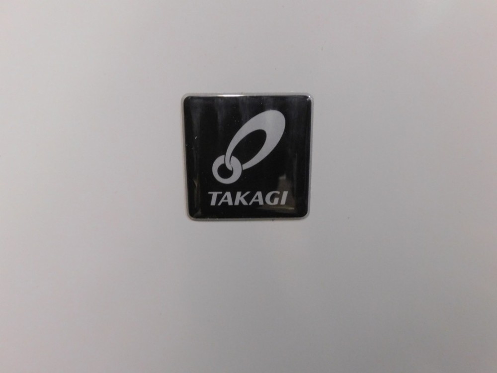 NEW TAKAGI 199k BTU Natural Gas Tankless Water Heater - TK-540X3-NIH - Dinged