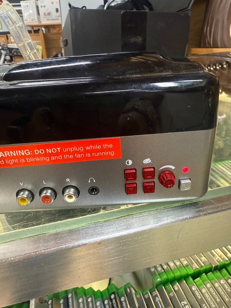 The Sharper Image Entertainment Projector Model 1614974, Excellent