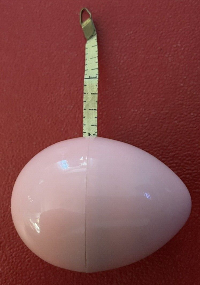Vintage PINK PLASTIC EGG Figural Tape Measure