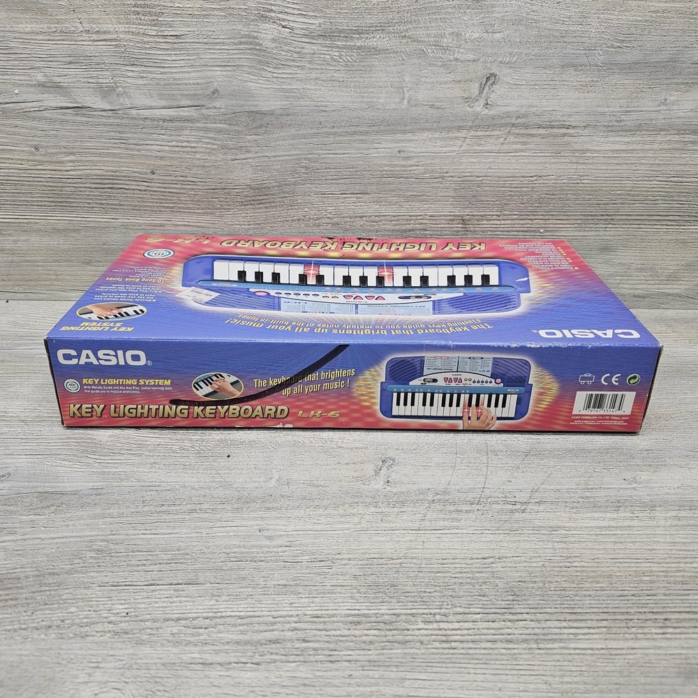 Casio LK-6 Key Lighting 32-Key Blue Learning Electronic Keyboard Battery Powered