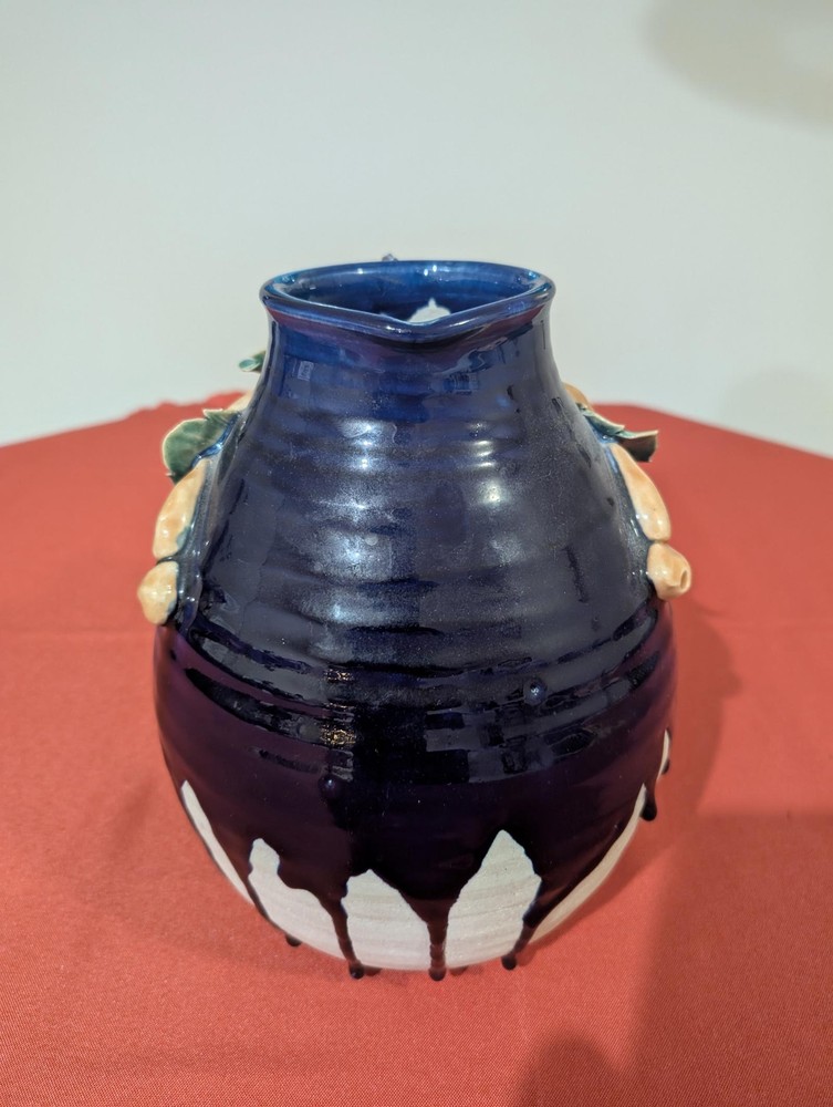 Artisan Ceramic Pitcher with Leaf Design