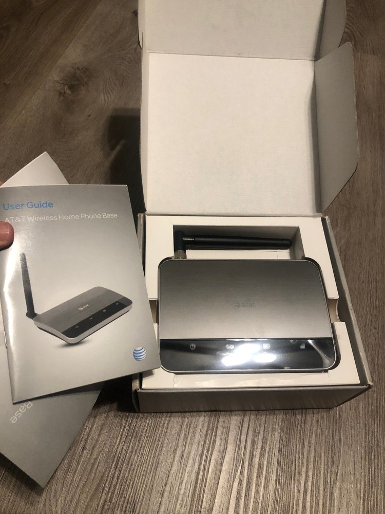 Open box AT&T Wireless Home Phone Base WF720 with accessories complete.