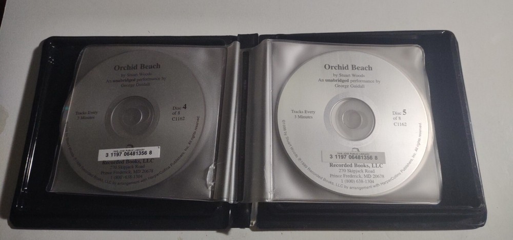 Orchid Beach by Stuart Woods. 7 Compact Discs. Missing Disc 8.