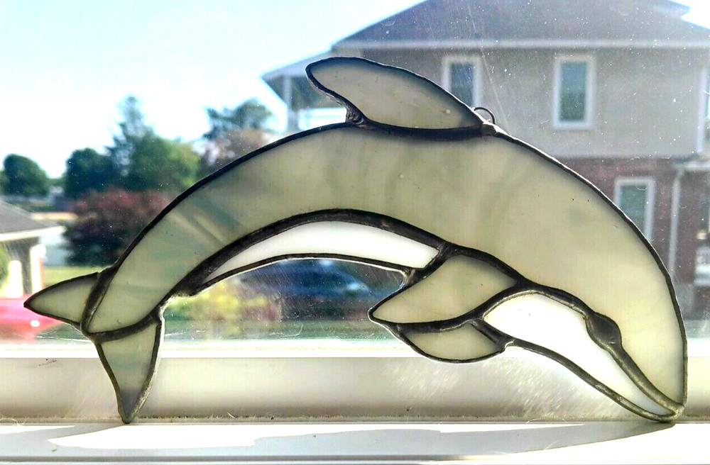 Two dolphins stained glass suncatchers