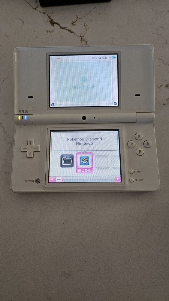 Nintendo DSi Handheld Game Console - White