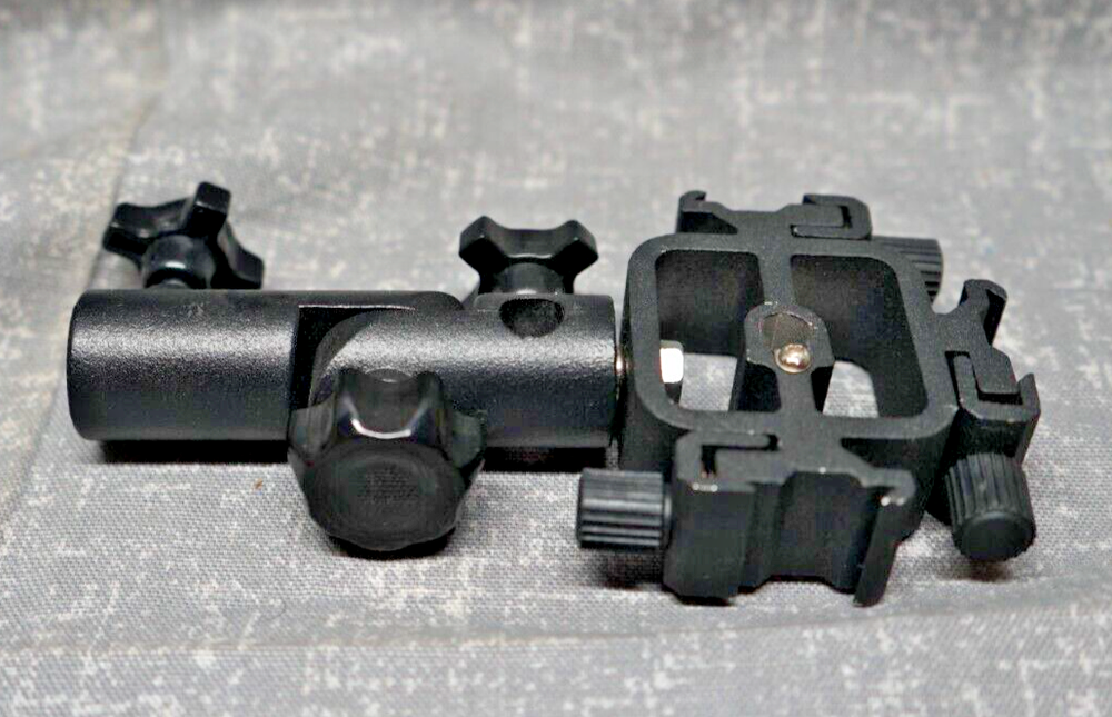 Promaster Triple Shoe Flash Mount Adapter with adjustable light pole mount.