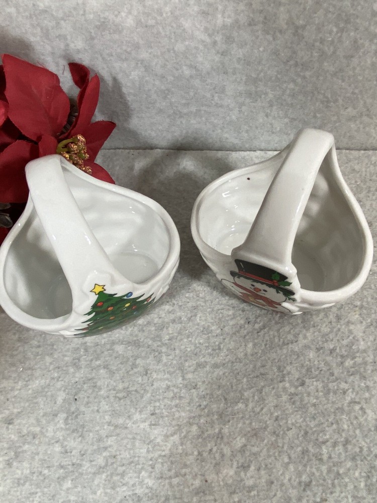 PAIR OF CHRISTMAS DESIGN CERAMIC BASKETS.