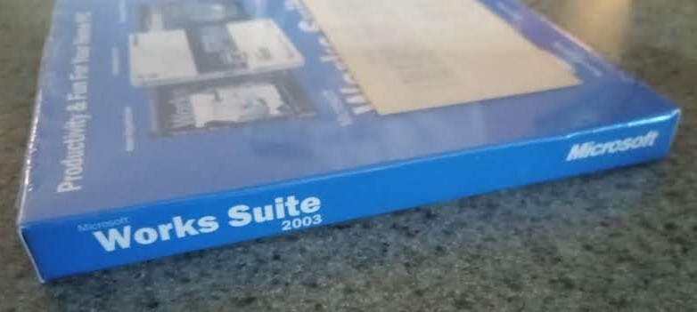 Microsoft Works Suite 2003 Software New SEALED- Comes With Key. Ships FREE.