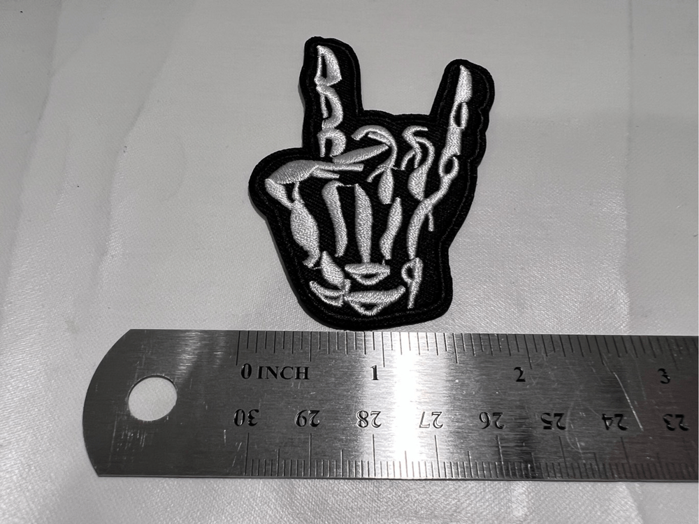 Skelton Hand Showing Horns Iron on Patch