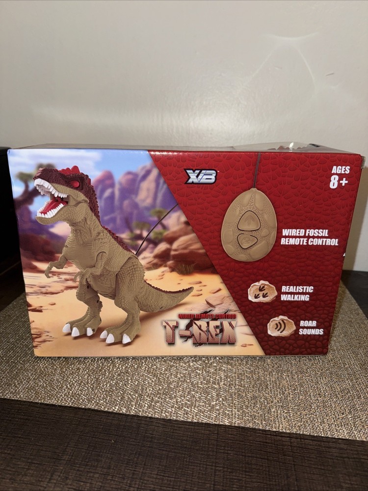 WIRED REMOTE CONTROL T-REX W/WIRED FOSSIL REMOTE CONTROL. NEW