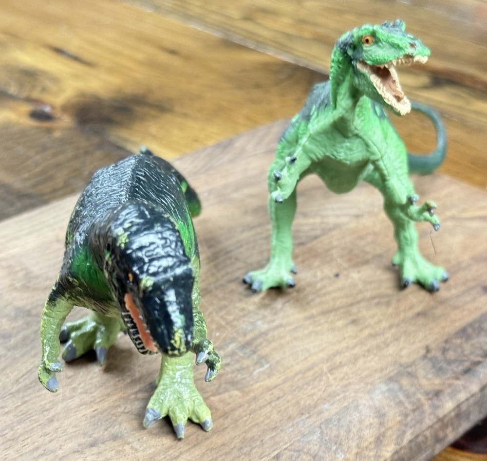 Carnegie Collection dinosaur models original and revised Allosaurus