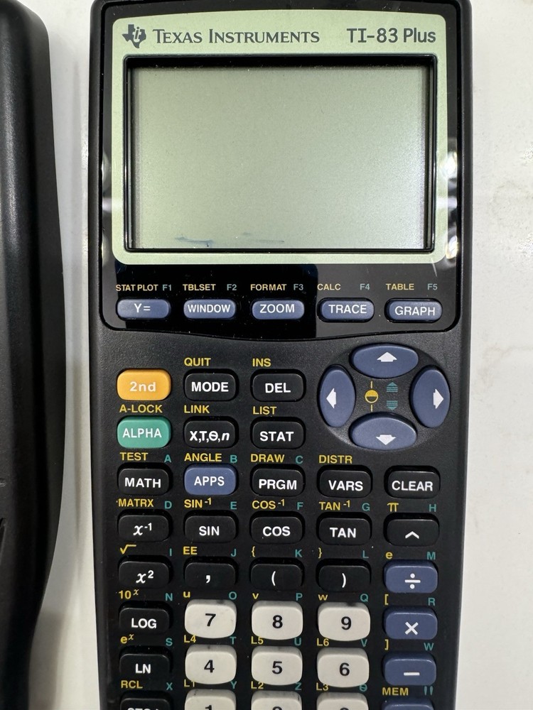 Texas Instruments TI-83 Handheld Graphing Calculator