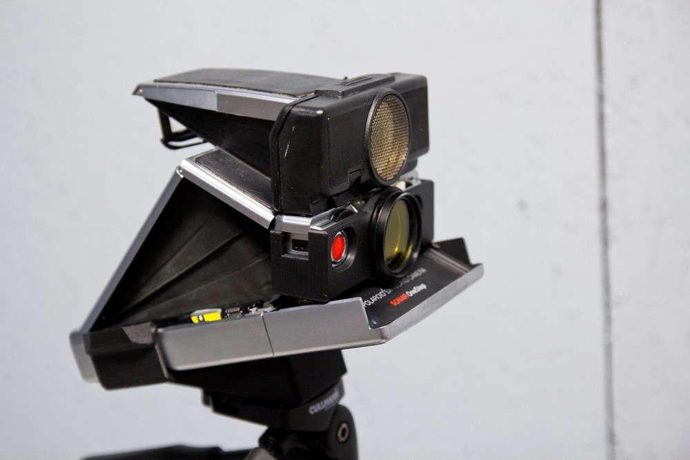 Tripod mount for Polaroid SX-70 Instant camera