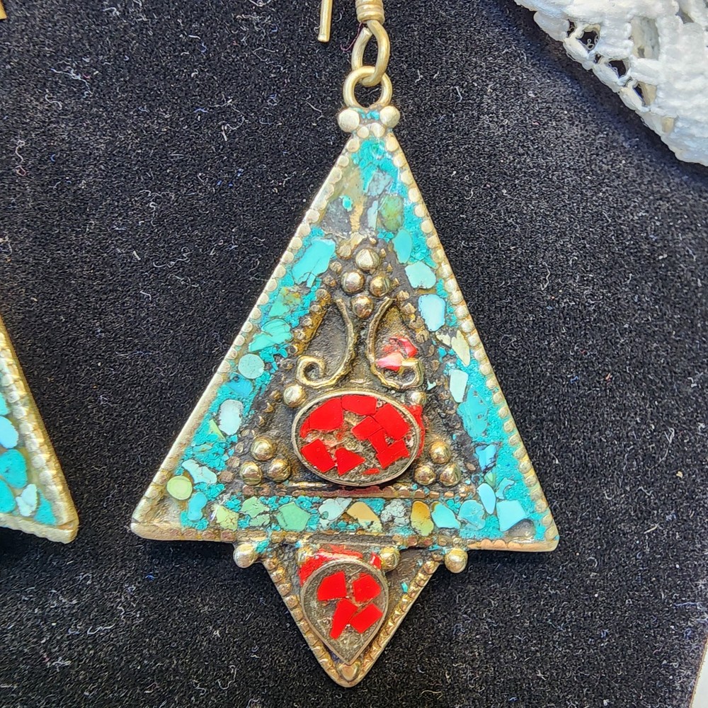 Triangle-shaped dangle earrings featuring mosaic-style turquoise