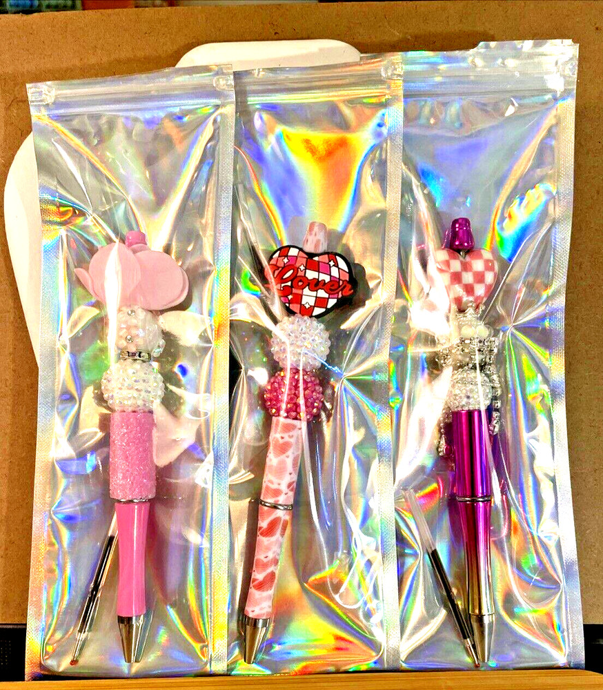 3 miscellaneous beaded pens with 1 ink refill each