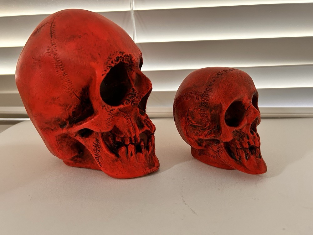 2 EA. RANDOTTI ORIGINAL LARGE & MEDIUM FLUORESCENT RED SKULLS STILL GLOW