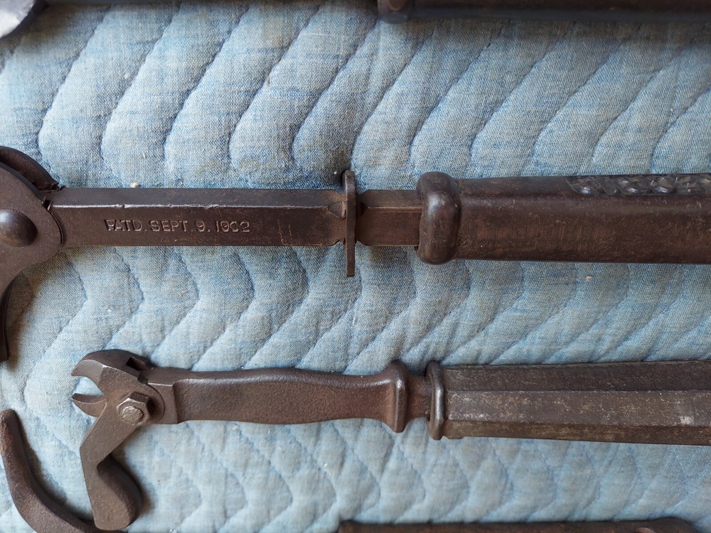 Collection of 8 different antique nail pullers