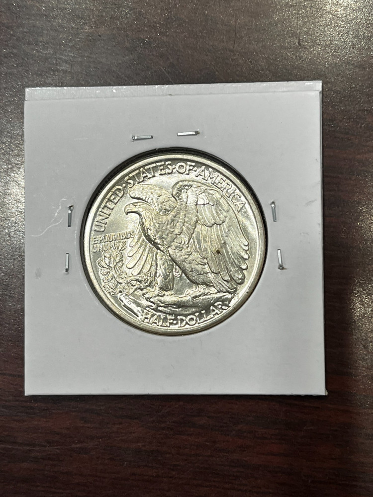 1942 LIBERTY WALKING SILVER HALF HIGH GRADE UNC