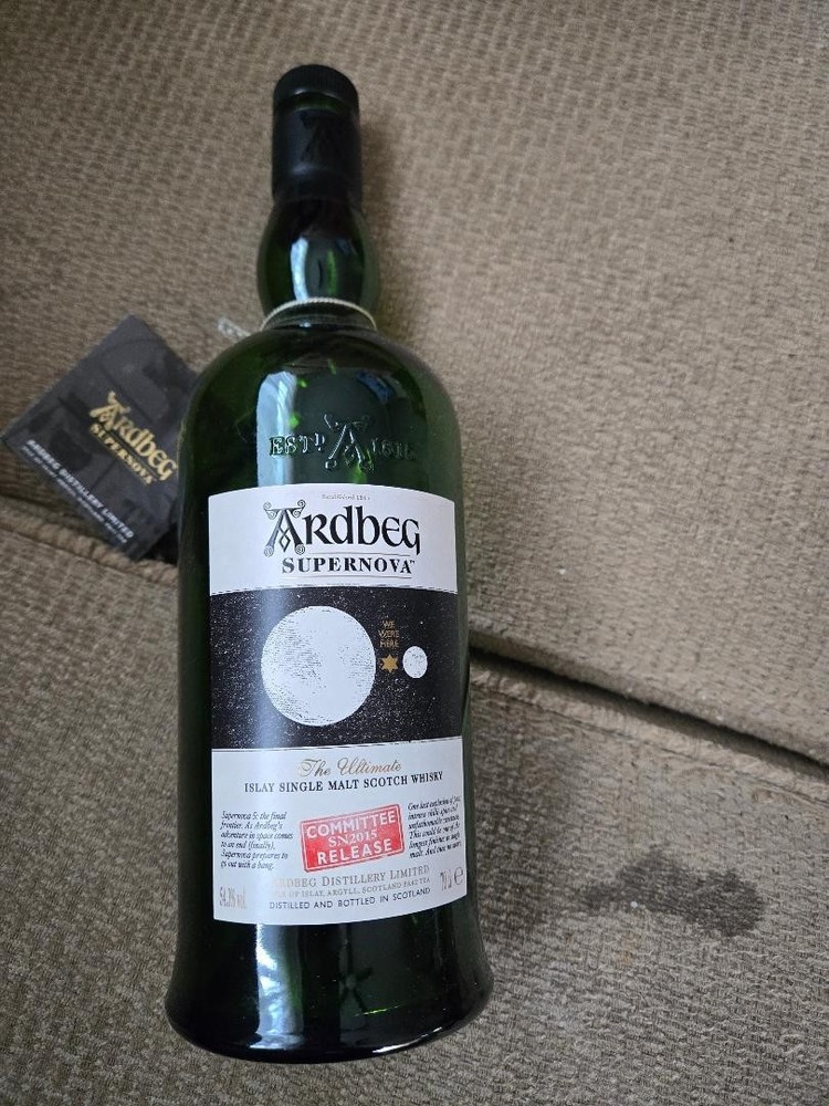 Ardbeg Supernova 2009 empty bottle and brochure