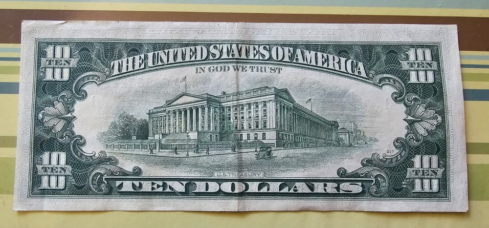 $10 bill 1969c off center front and back with seal misalignment error