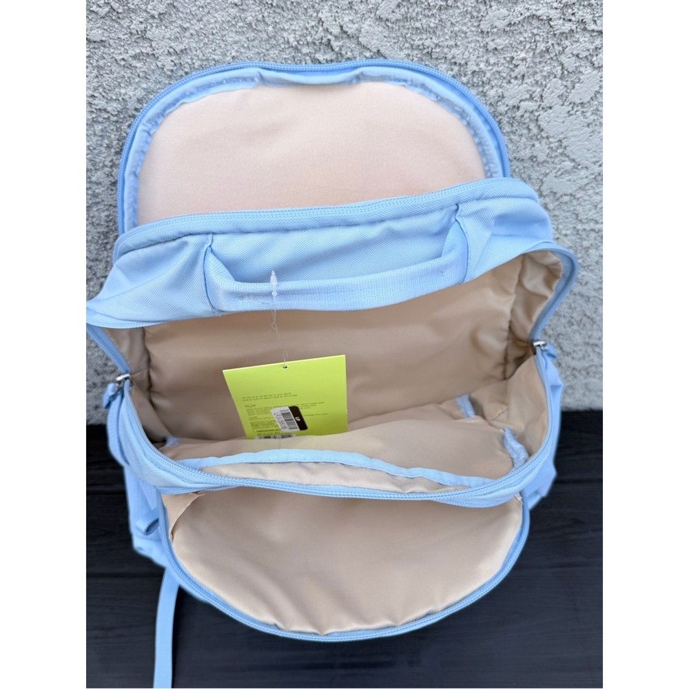 all in motion Light Blue Bungee Front Backpack