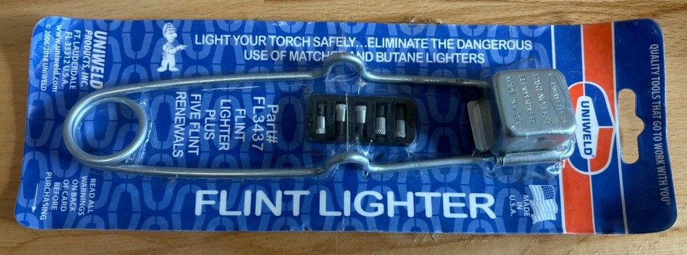 Uniwield Flint Torch Lighter with 5 Replacement Flints. NIP. Wielding Tool.