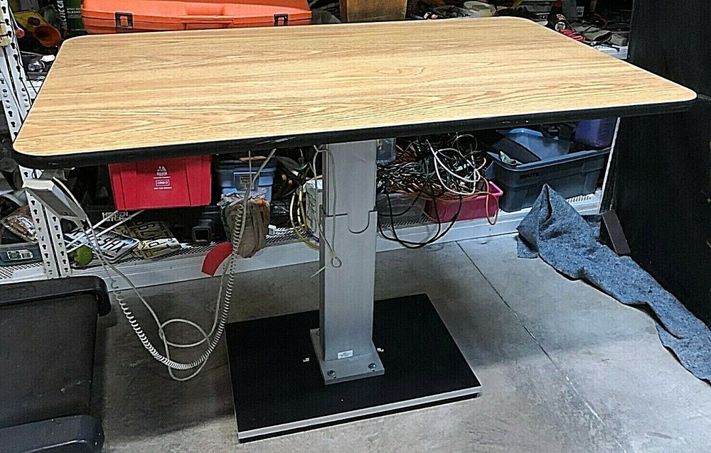 Huasmann electronic elevating table 4375 work surface adjustable 27” to 43” high