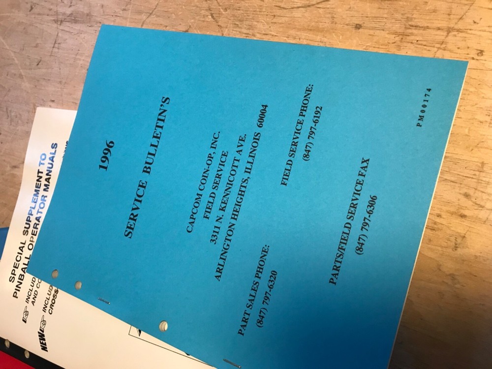 Capcom Service Bulletins Binder with Arcade Pinball game manuals, service, notes