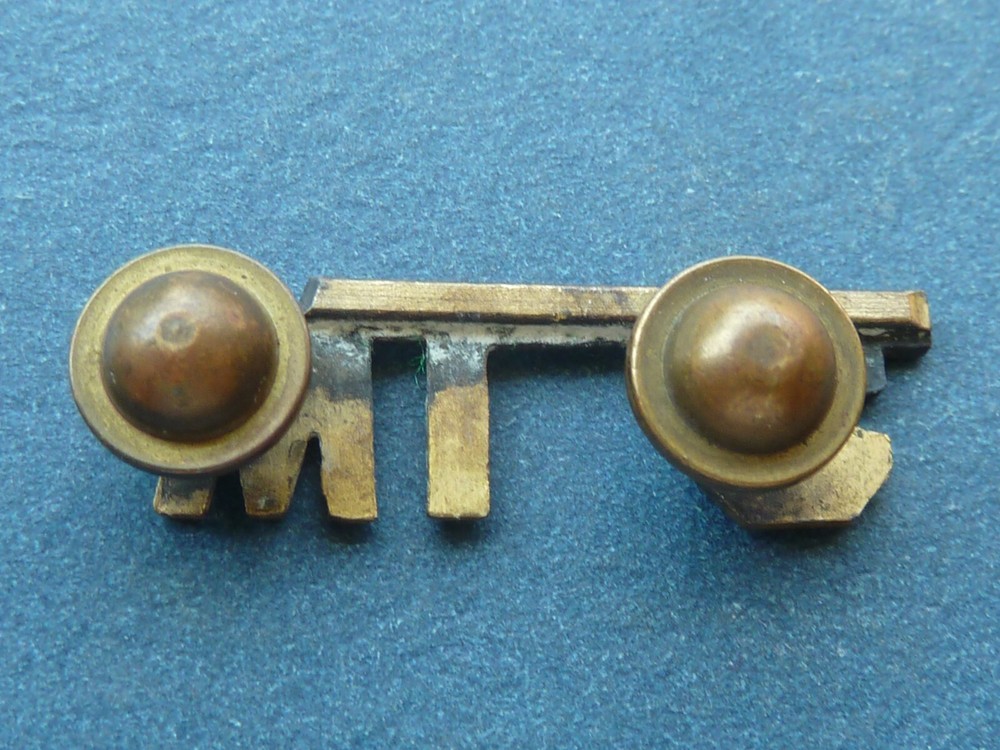 WWI (?) collar insignia W.L.C.