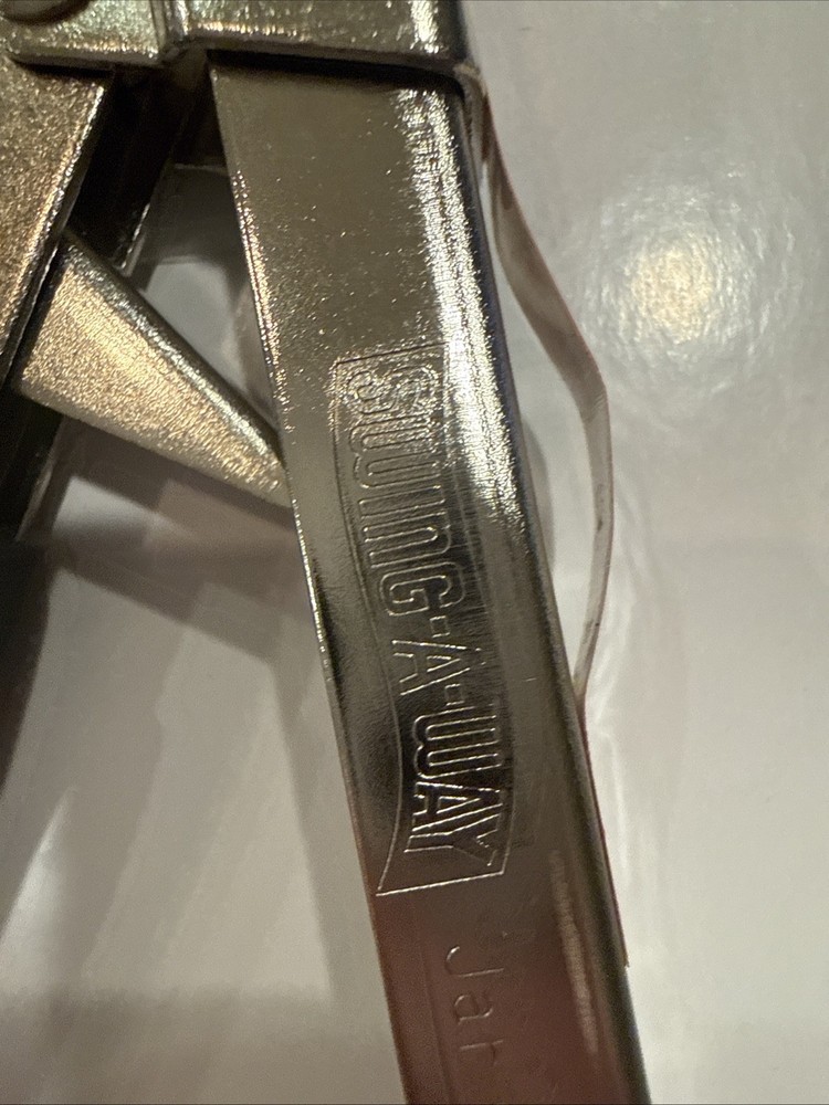 Swing-A-Way Jar Opener