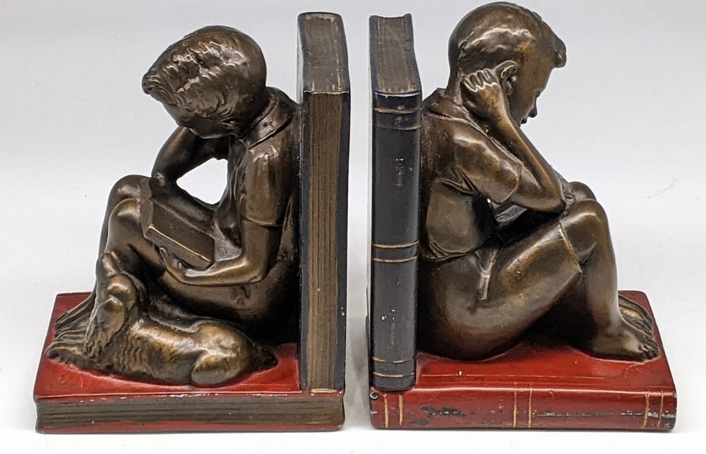Boy reading with Dog Bookends heavy !