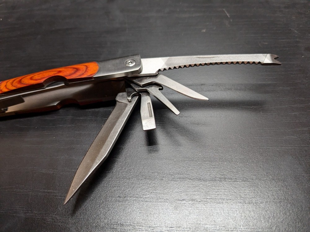 Elk Ridge-Multi Tool With Assorted Tools -pliers -knife-sockets- Bottle Opener