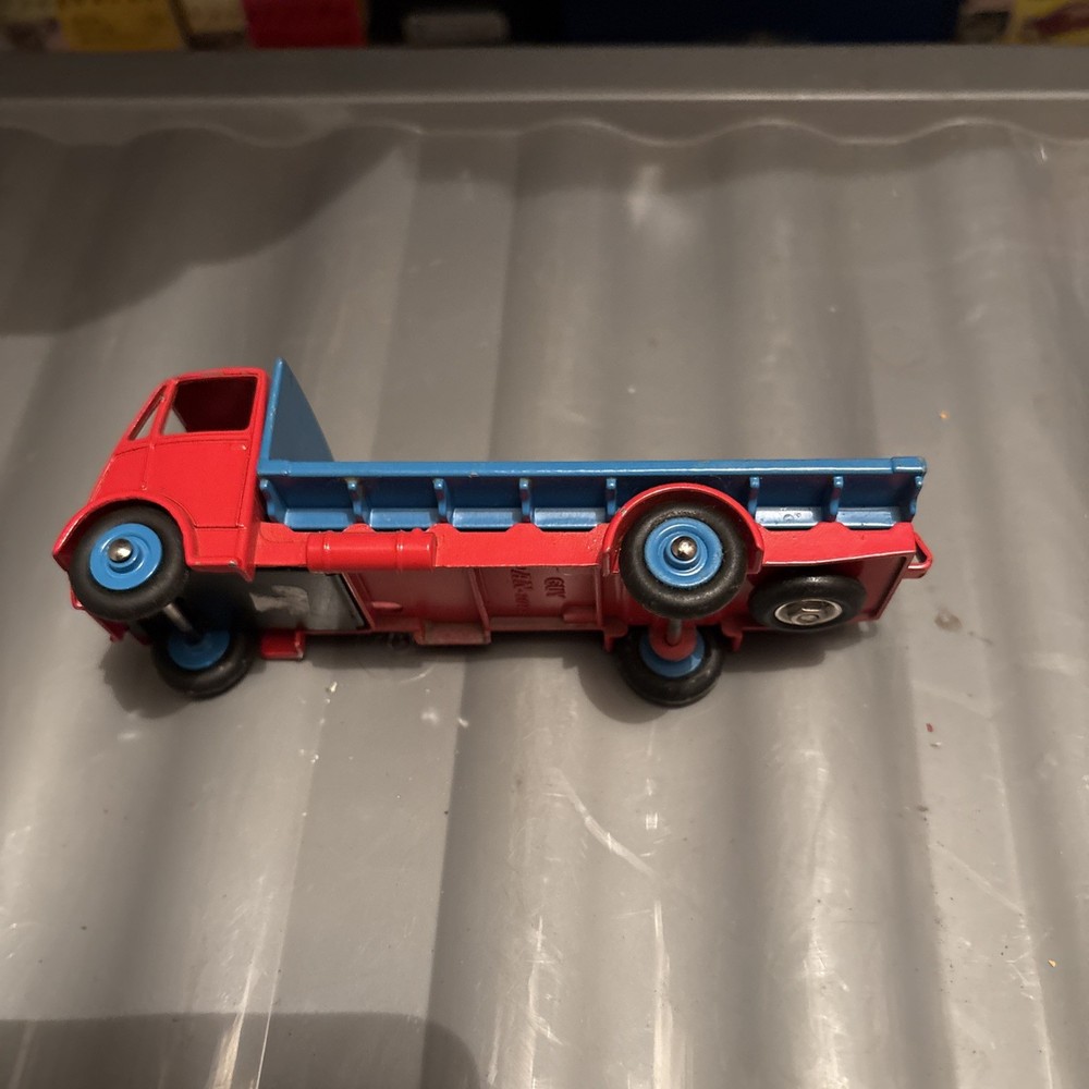 DINKY GUY FLATBED 1950s.red & light blue .